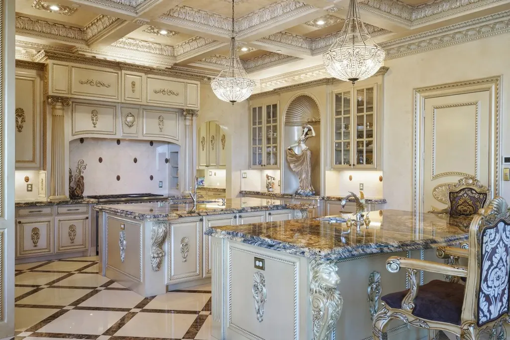 A Venetian Inspired Plano Estate Lists for 7.5 Million as a Rare Architectural Masterpiece in Kings Gate 5 Luxury kitchen inside the Venetian inspired estate at 6509 Sudbury Rd in Plano featuring ornate cabinetry marble counters crystal chandeliers and detailed ceiling moldings.