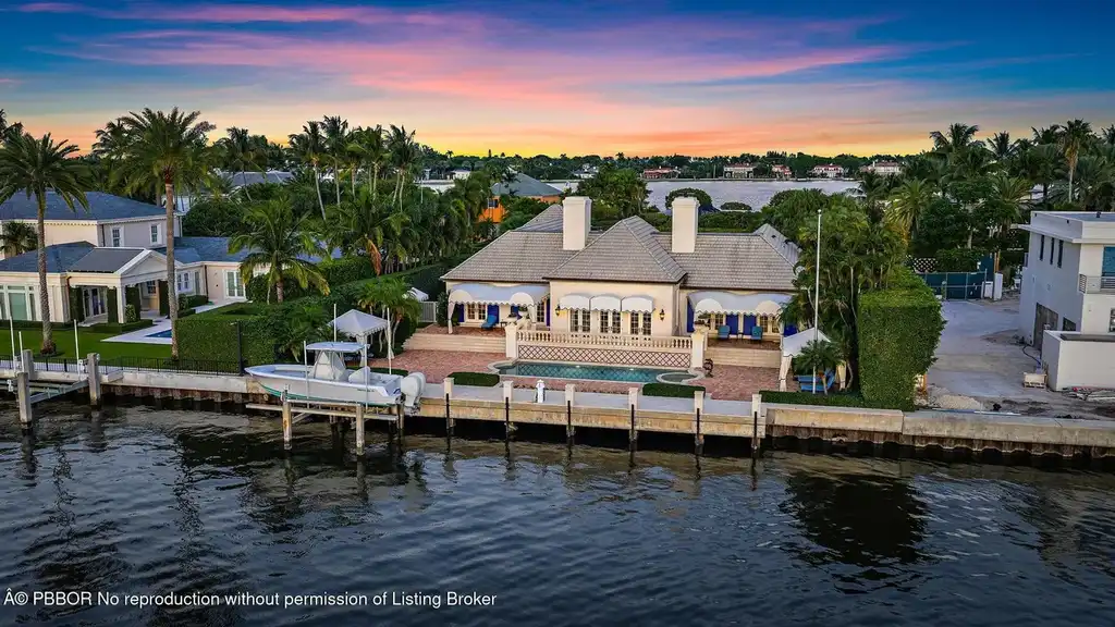 $35 Million Iconic Waterfront Estate on Everglades Island in Palm Beach 5 Waterfront exterior view of 751 Island Dr showcasing a luxury Palm Beach home for sale on Everglades Island