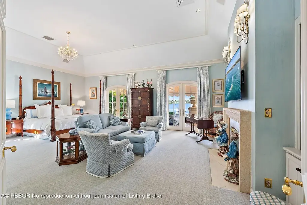 $35 Million Iconic Waterfront Estate on Everglades Island in Palm Beach 12 Waterfront exterior view of 751 Island Dr showcasing a luxury Palm Beach home for sale on Everglades Island