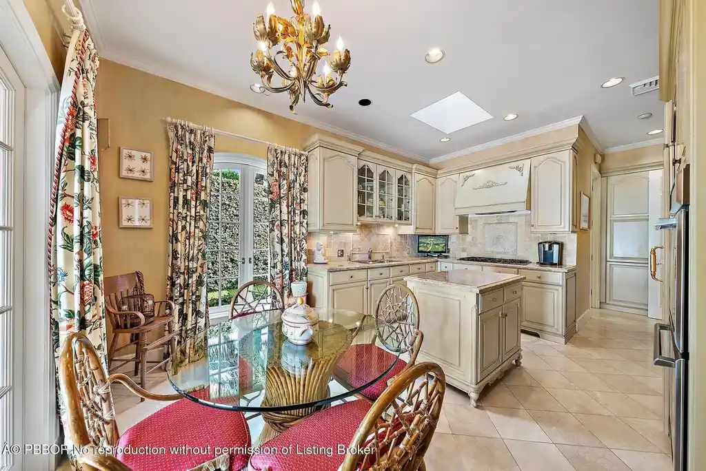 $35 Million Iconic Waterfront Estate on Everglades Island in Palm Beach 8 Waterfront exterior view of 751 Island Dr showcasing a luxury Palm Beach home for sale on Everglades Island