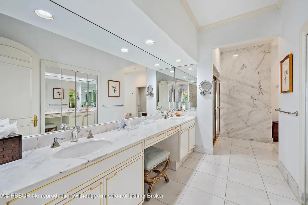 $35 Million Iconic Waterfront Estate on Everglades Island in Palm Beach 11 Waterfront exterior view of 751 Island Dr showcasing a luxury Palm Beach home for sale on Everglades Island