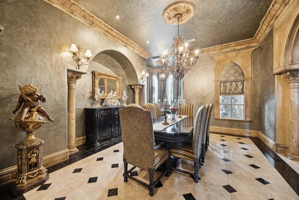 Castle Estate Heads to Auction at 6 Million as a Hilltop Masterpiece in Fort Worth 6 Formal dining room at 9553 Bella Terra Dr Fort Worth Texas featuring a long dining table ornate chandelier arched stone columns textured walls and classical European design