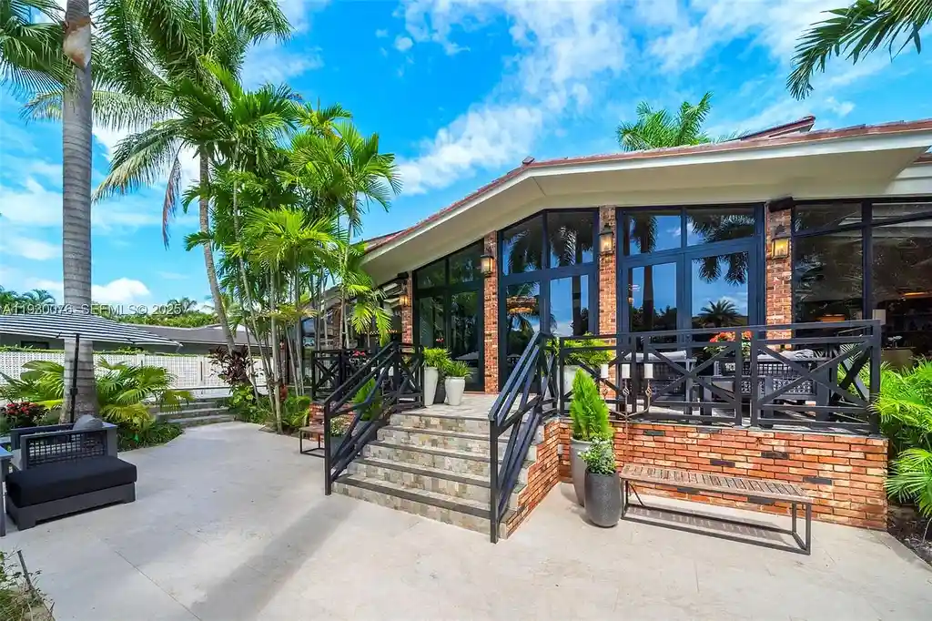 Exceptional $25 Million Waterfront Estate in One of Miami’s Most Exclusive Gated Island Enclaves 5 Waterfront luxury home at 980 Belle Meade Island Dr featuring a private pool and 120 feet of canal frontage in Miami