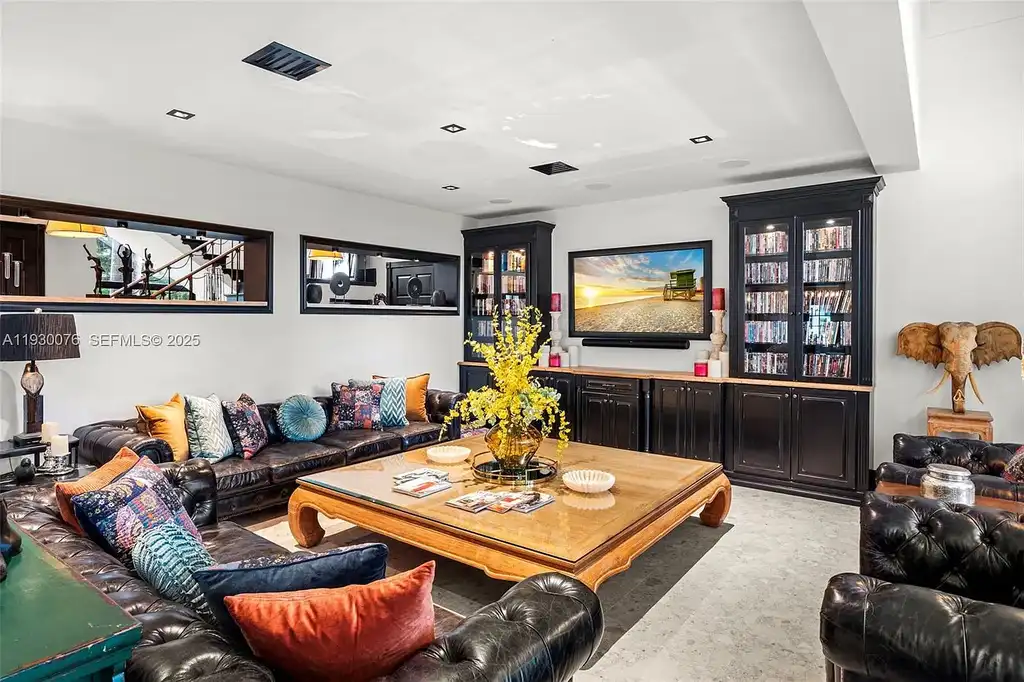 Exceptional $25 Million Waterfront Estate in One of Miami’s Most Exclusive Gated Island Enclaves 7 Waterfront luxury home at 980 Belle Meade Island Dr featuring a private pool and 120 feet of canal frontage in Miami