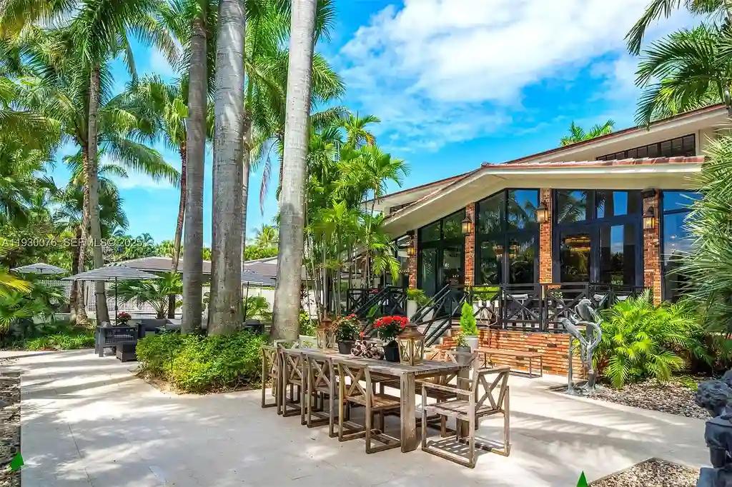 Exceptional $25 Million Waterfront Estate in One of Miami’s Most Exclusive Gated Island Enclaves 17 Waterfront luxury home at 980 Belle Meade Island Dr featuring a private pool and 120 feet of canal frontage in Miami