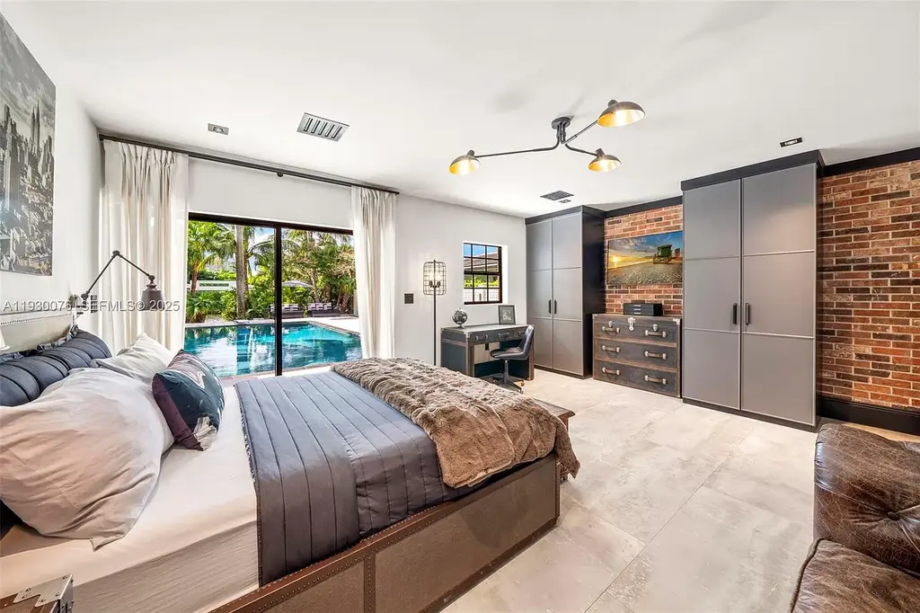 Exceptional $25 Million Waterfront Estate in One of Miami’s Most Exclusive Gated Island Enclaves 13 Waterfront luxury home at 980 Belle Meade Island Dr featuring a private pool and 120 feet of canal frontage in Miami