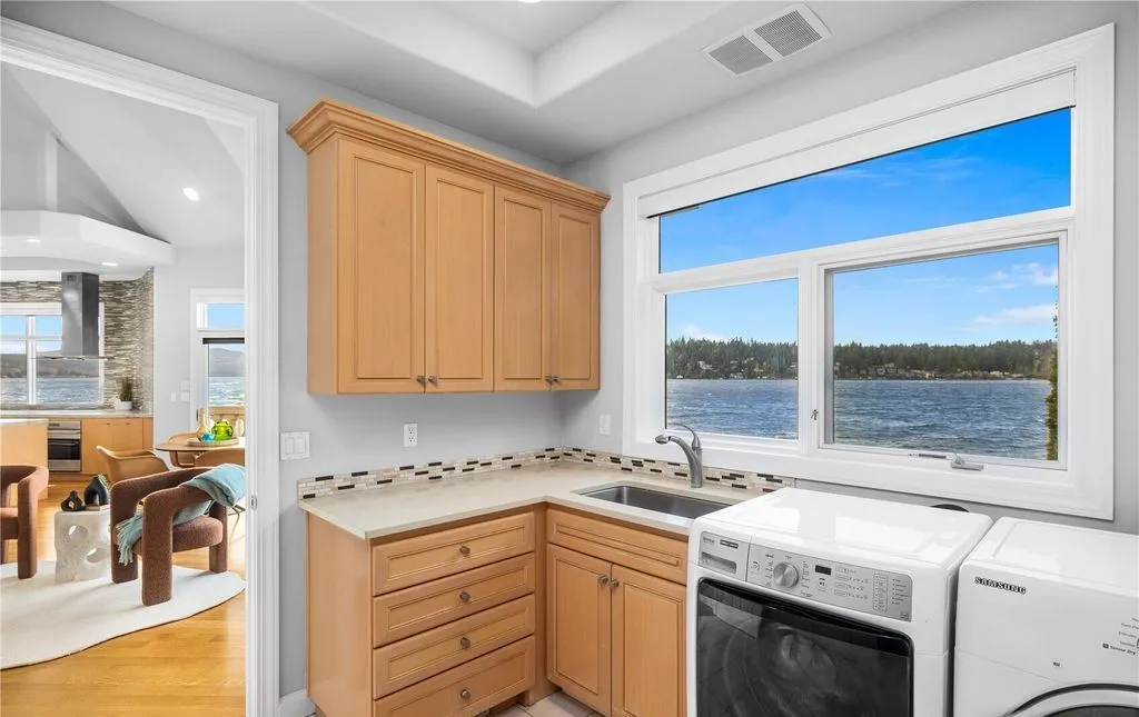 An Extraordinary Gated Waterfront Masterpiece Offering Timeless Views and Modern Ease at $6.5M 20 A Magnificent Waterfront Escape at 2819 E Lake Sammamish Parkway NE Blends Modern Comfort with Endless Lake Views 14