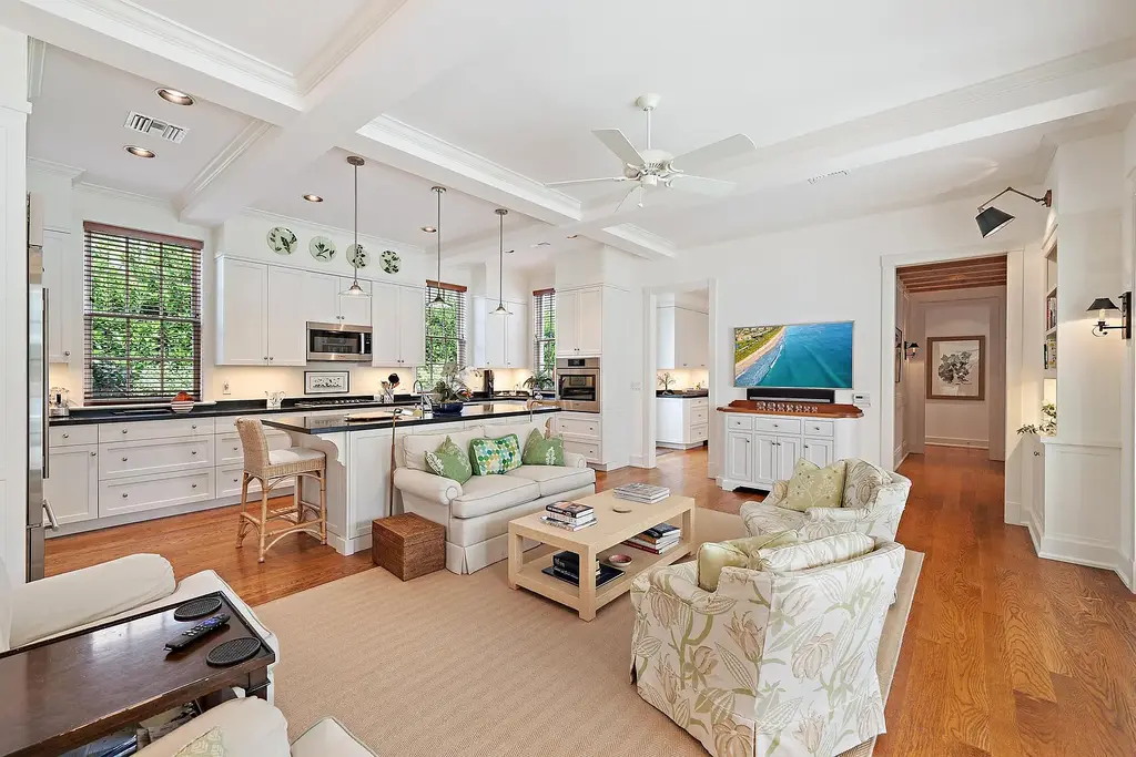 Stunning New Garden Estate in Hobe Sound Hits the Market for $5.5 Million 7 Bright living room with garden views inside 11726 SE Laurel Lane, a luxury home in Hobe Sound