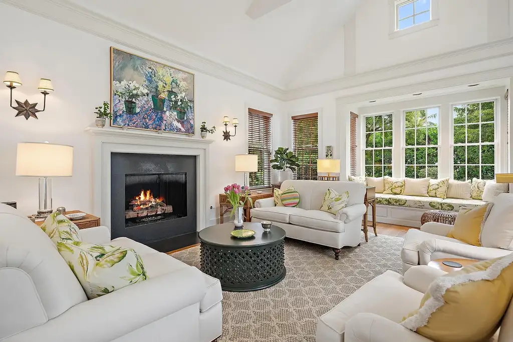 Stunning New Garden Estate in Hobe Sound Hits the Market for $5.5 Million 6 Bright living room with garden views inside 11726 SE Laurel Lane, a luxury home in Hobe Sound