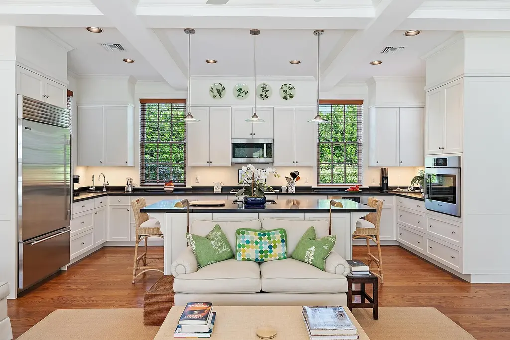 Stunning New Garden Estate in Hobe Sound Hits the Market for $5.5 Million 10 Bright living room with garden views inside 11726 SE Laurel Lane, a luxury home in Hobe Sound