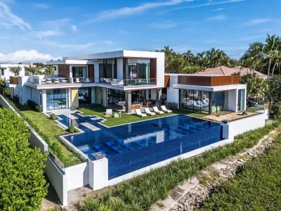 $33.3 Million Ultra-Luxury Waterfront Estate Sets a Bold New Standard in Jupiter Real Estate 1 126 Spinnaker Lane Lane Lists for 33.25 Million a Spectacular Ultra Luxury Masterpiece Redefining Jupiter Real Estate 1