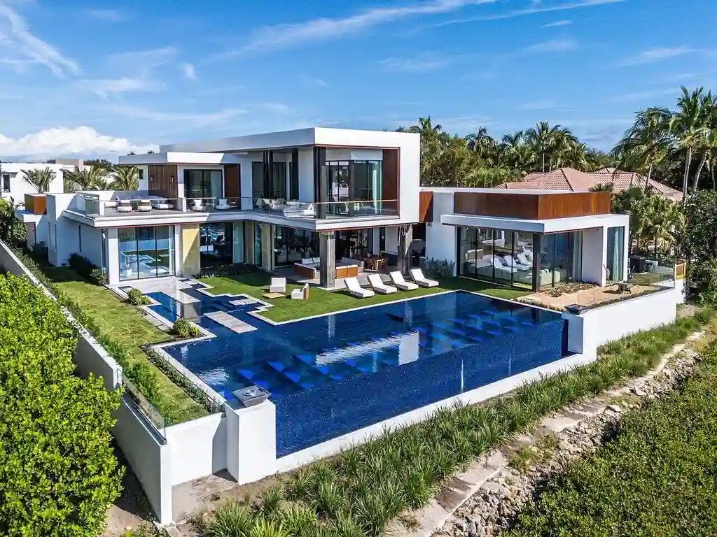 $33.3 Million Ultra-Luxury Waterfront Estate Sets a Bold New Standard in Jupiter Real Estate 5 Front exterior of 126 Spinnaker Lane Lane, a newly built ultra-luxury home in Admirals Cove, Jupiter, Florida