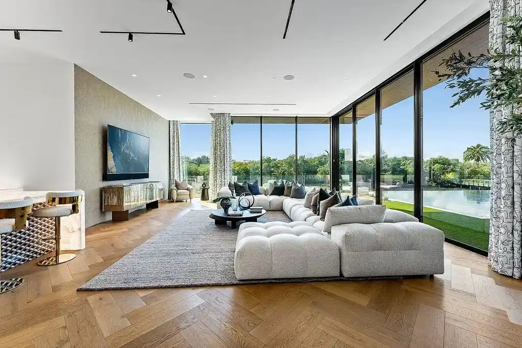 $33.3 Million Ultra-Luxury Waterfront Estate Sets a Bold New Standard in Jupiter Real Estate 15 Front exterior of 126 Spinnaker Lane Lane, a newly built ultra-luxury home in Admirals Cove, Jupiter, Florida