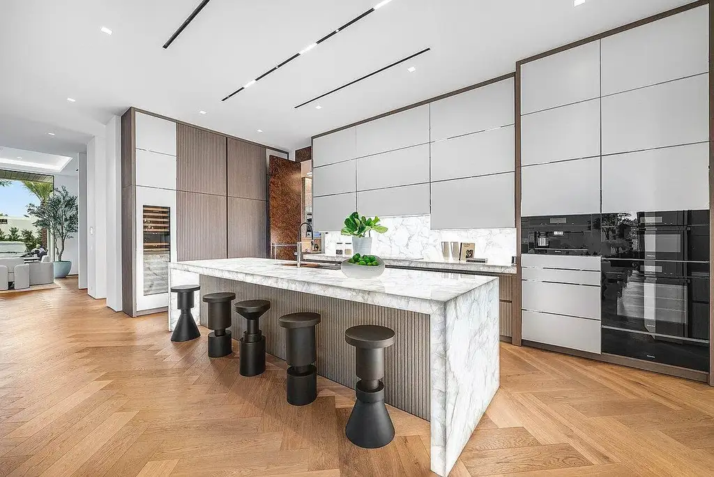 $33.3 Million Ultra-Luxury Waterfront Estate Sets a Bold New Standard in Jupiter Real Estate 8 Front exterior of 126 Spinnaker Lane Lane, a newly built ultra-luxury home in Admirals Cove, Jupiter, Florida