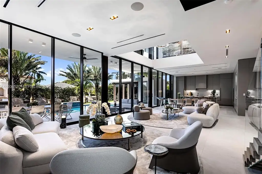 $13.9 Million Exceptional Waterfront Estate Sets a New Benchmark for Luxury Living in North Miami 6 Canal-front view of a luxury home in North Miami for sale with 75 feet of direct water frontage.