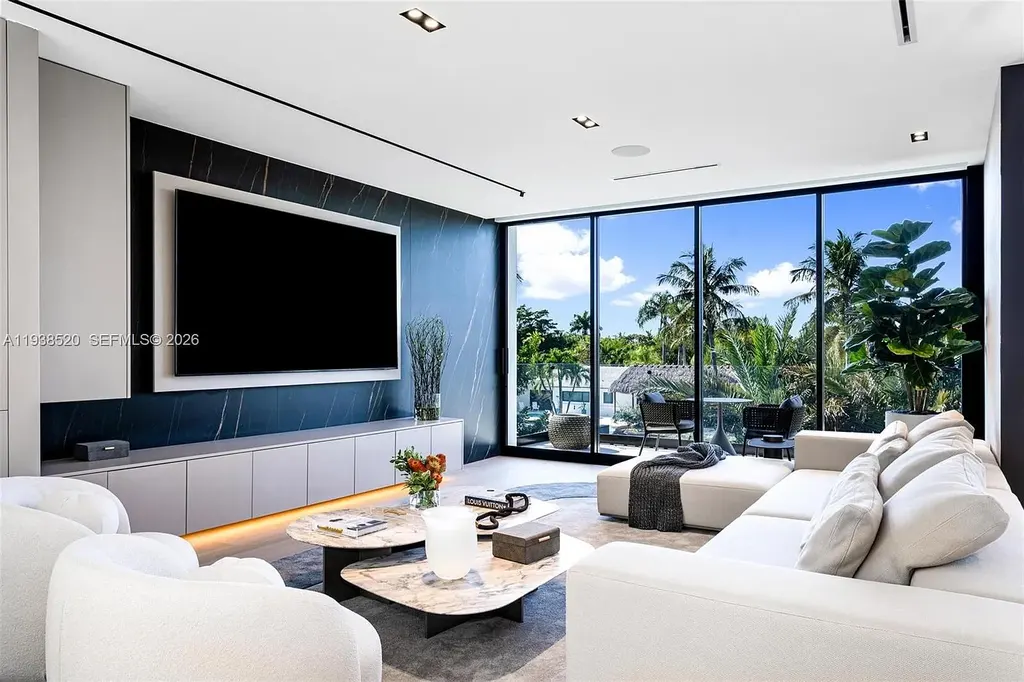 $13.9 Million Exceptional Waterfront Estate Sets a New Benchmark for Luxury Living in North Miami 14 Canal-front view of a luxury home in North Miami for sale with 75 feet of direct water frontage.