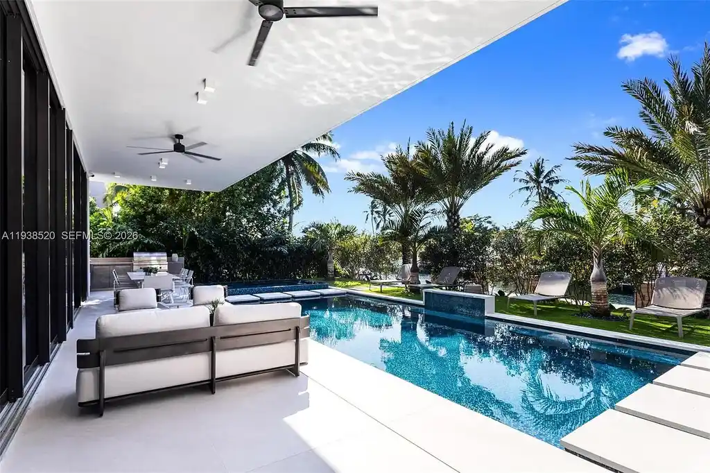 $13.9 Million Exceptional Waterfront Estate Sets a New Benchmark for Luxury Living in North Miami 15 Canal-front view of a luxury home in North Miami for sale with 75 feet of direct water frontage.