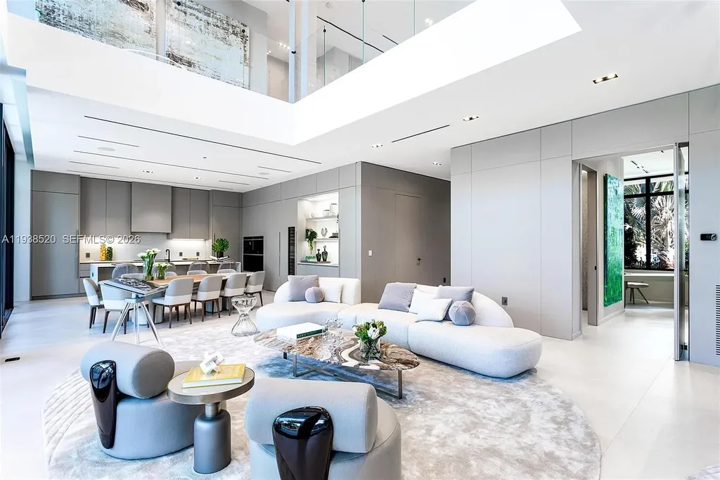 $13.9 Million Exceptional Waterfront Estate Sets a New Benchmark for Luxury Living in North Miami 9 Canal-front view of a luxury home in North Miami for sale with 75 feet of direct water frontage.