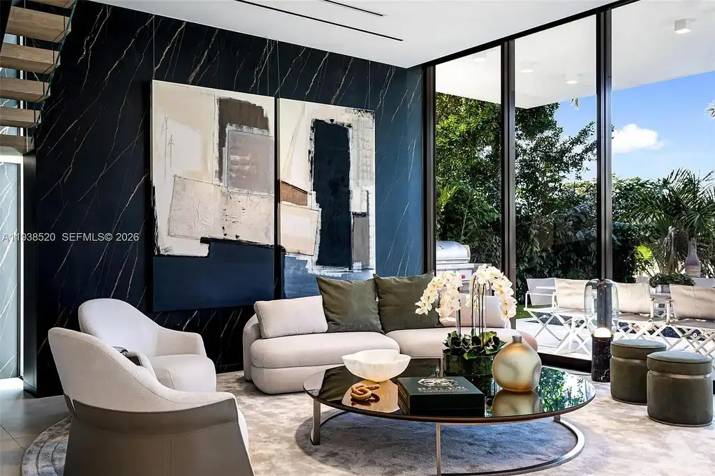 $13.9 Million Exceptional Waterfront Estate Sets a New Benchmark for Luxury Living in North Miami 8 Canal-front view of a luxury home in North Miami for sale with 75 feet of direct water frontage.