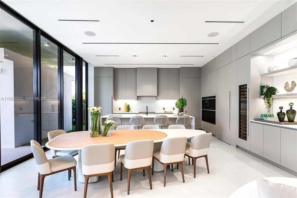 $13.9 Million Exceptional Waterfront Estate Sets a New Benchmark for Luxury Living in North Miami 10 Canal-front view of a luxury home in North Miami for sale with 75 feet of direct water frontage.