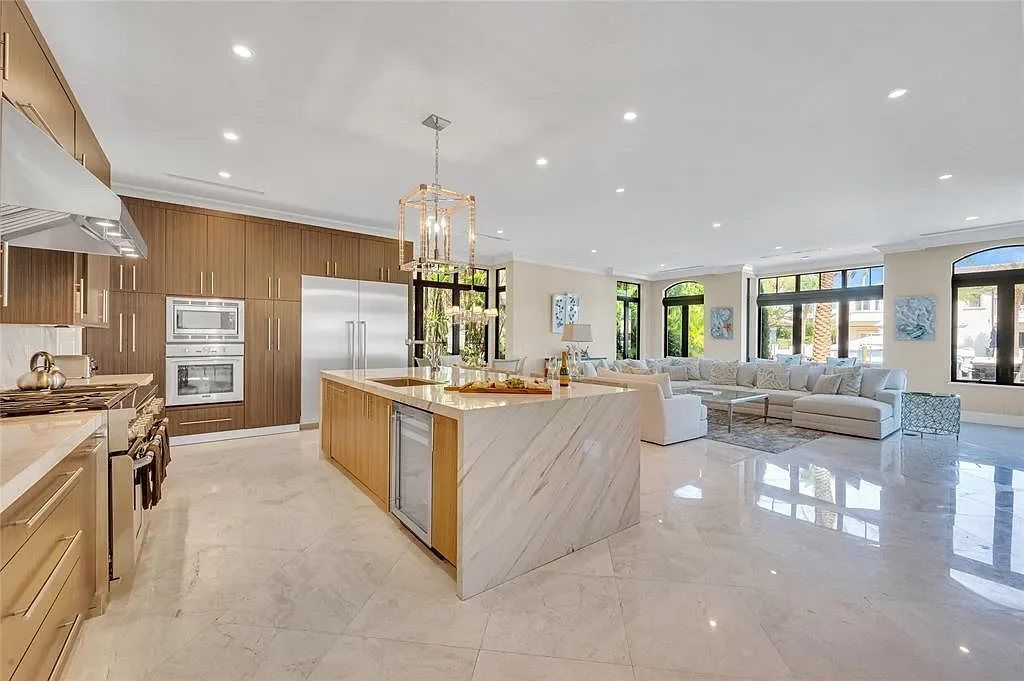 $9.9 Million Architectural Masterpiece Redefining Waterfront Luxury in Fort Lauderdale 10 Contemporary interior design featuring floor-to-ceiling glass at a Fort Lauderdale luxury residence