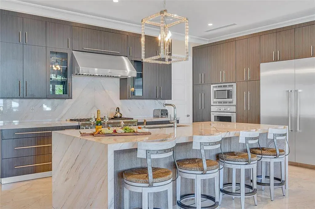 $9.9 Million Architectural Masterpiece Redefining Waterfront Luxury in Fort Lauderdale 9 Contemporary interior design featuring floor-to-ceiling glass at a Fort Lauderdale luxury residence