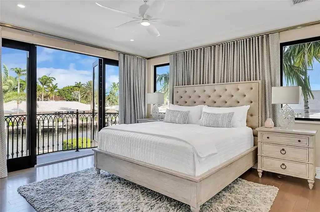 $9.9 Million Architectural Masterpiece Redefining Waterfront Luxury in Fort Lauderdale 13 Contemporary interior design featuring floor-to-ceiling glass at a Fort Lauderdale luxury residence