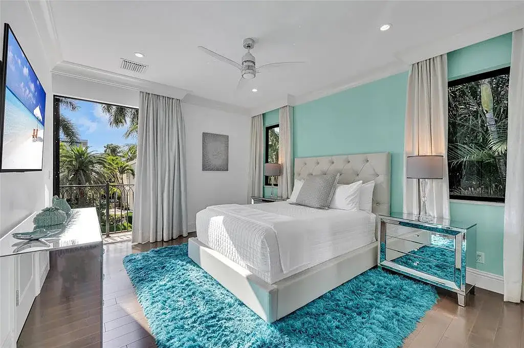 $9.9 Million Architectural Masterpiece Redefining Waterfront Luxury in Fort Lauderdale 15 Contemporary interior design featuring floor-to-ceiling glass at a Fort Lauderdale luxury residence