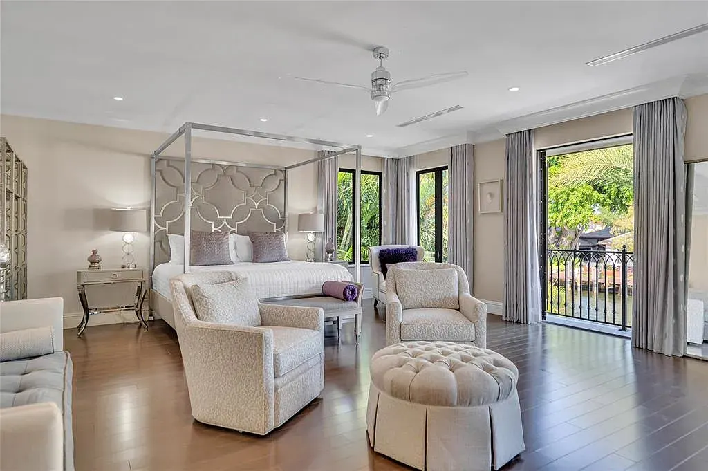 $9.9 Million Architectural Masterpiece Redefining Waterfront Luxury in Fort Lauderdale 12 Contemporary interior design featuring floor-to-ceiling glass at a Fort Lauderdale luxury residence