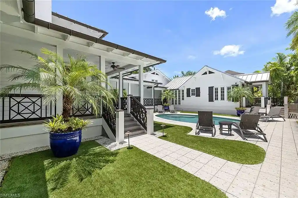 Timeless $11 Million Estate in Olde Naples Offering Classic Architecture, and Walkable Access to the Beach 15 Exceptional outdoor entertaining area at 163 10th AVE S, one of Olde Naples’ finest residences