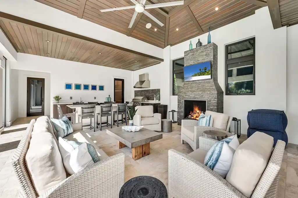 Stunning $8.4 Million Moorings Masterpiece Showcases Timeless Luxury Living in Naples 13 Front exterior of 2025 Crayton RD, a $8.395M custom luxury home in The Moorings, Naples Real Estate