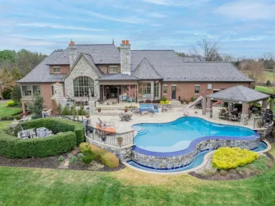 An Exceptional Virginia Home Offering Year-Round Resort-Style Living at $5,999,999 3 22665 Creighton Farms Dr An Elite Virginia Estate Offering Resort Style Living 25