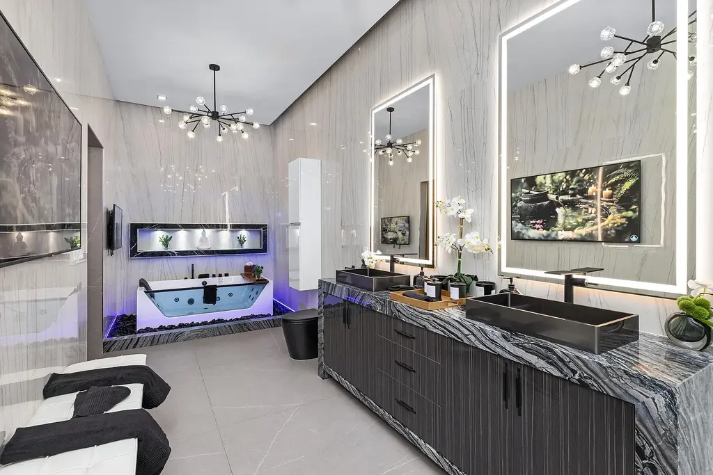 $10 Million Stunning Contemporary Estate Redefining Luxury Living in Fort Lauderdale 15 Modern kitchen at 2301 NE 37th Drive highlighting walnut cabinetry and refined stone surfaces