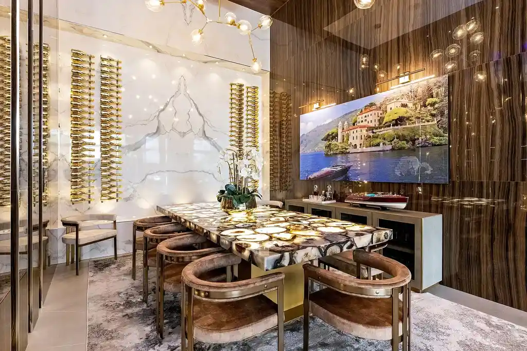 $10 Million Stunning Contemporary Estate Redefining Luxury Living in Fort Lauderdale 13 Modern kitchen at 2301 NE 37th Drive highlighting walnut cabinetry and refined stone surfaces