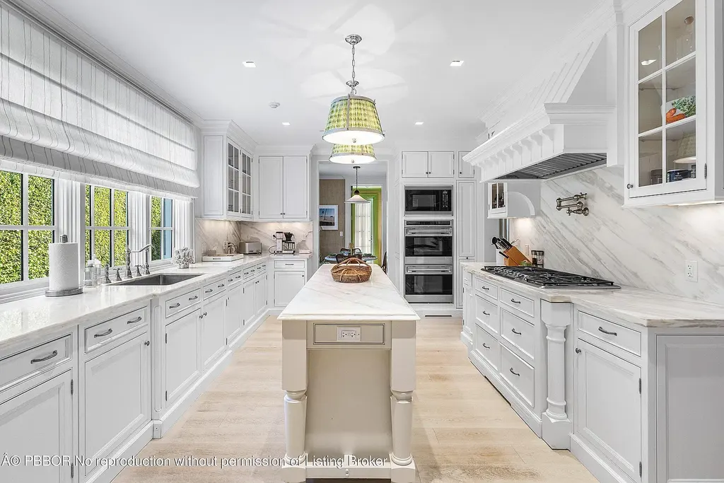 A $17.8 Million Cape Dutch Estate in Palm Beach’s North End with Timeless Architectural Appeal 9 Exterior view of 242 Tangier Ave, a Cape Dutch–style Palm Beach home for sale located on a quiet North End street.