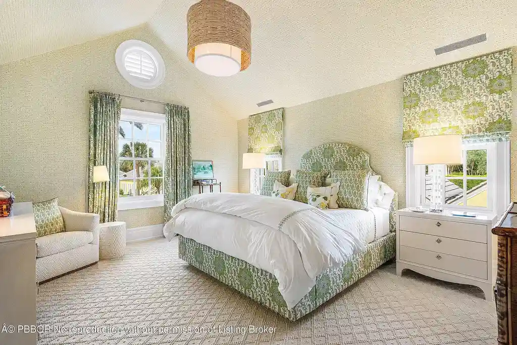 A $17.8 Million Cape Dutch Estate in Palm Beach’s North End with Timeless Architectural Appeal 15 Exterior view of 242 Tangier Ave, a Cape Dutch–style Palm Beach home for sale located on a quiet North End street.