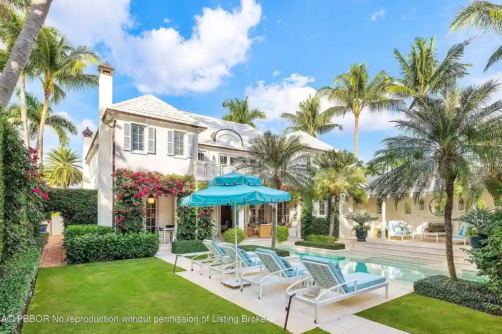 A $17.8 Million Cape Dutch Estate in Palm Beach’s North End with Timeless Architectural Appeal 6 Exterior view of 242 Tangier Ave, a Cape Dutch–style Palm Beach home for sale located on a quiet North End street.