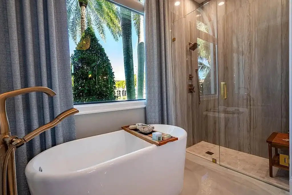 $15 Million Exceptional Waterfront Masterpiece in Lighthouse Point with Timeless Luxury 11 Waterfront home at 2457 NE 26th St in Lighthouse Point with private yacht dockage, resort-style pool, and direct ocean access