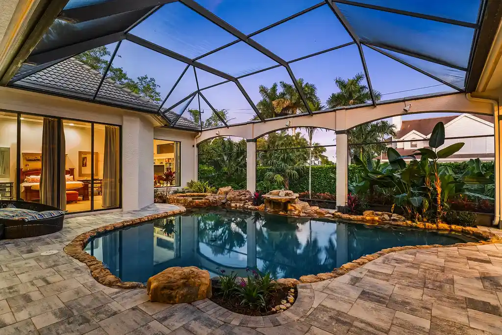$9.4 Million Port Royal Residence Offering a Rare Opportunity in Naples Real Estate 15 Exterior view of 2755 Lantern LN, a luxury Port Royal home in Naples Real Estate set on a 0.47-acre landscaped lot