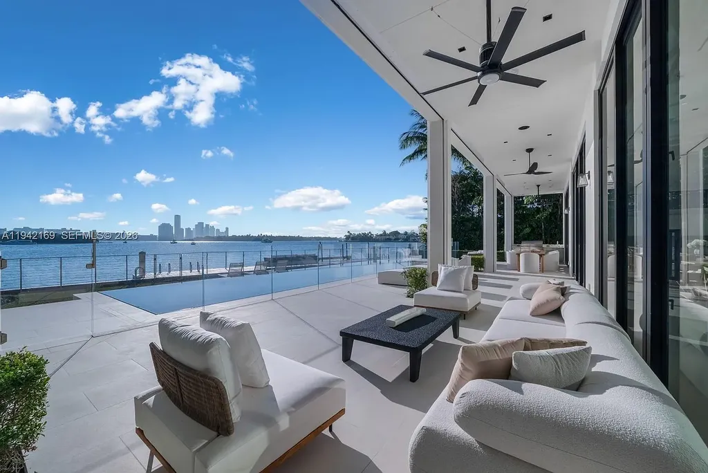 Stunning $35 Million Waterfront Masterpiece Redefining Luxury Living on Miami Beach’s Venetian Islands 17 Waterfront exterior of 33 E Di Lido Dr, a $35 million luxury home on Miami Beach’s Venetian Islands with direct Biscayne Bay frontage