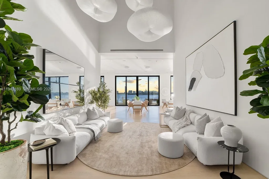 Stunning $35 Million Waterfront Masterpiece Redefining Luxury Living on Miami Beach’s Venetian Islands 8 Waterfront exterior of 33 E Di Lido Dr, a $35 million luxury home on Miami Beach’s Venetian Islands with direct Biscayne Bay frontage