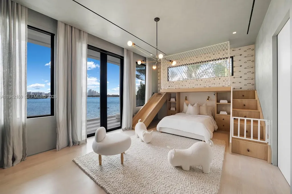 Stunning $35 Million Waterfront Masterpiece Redefining Luxury Living on Miami Beach’s Venetian Islands 15 Waterfront exterior of 33 E Di Lido Dr, a $35 million luxury home on Miami Beach’s Venetian Islands with direct Biscayne Bay frontage