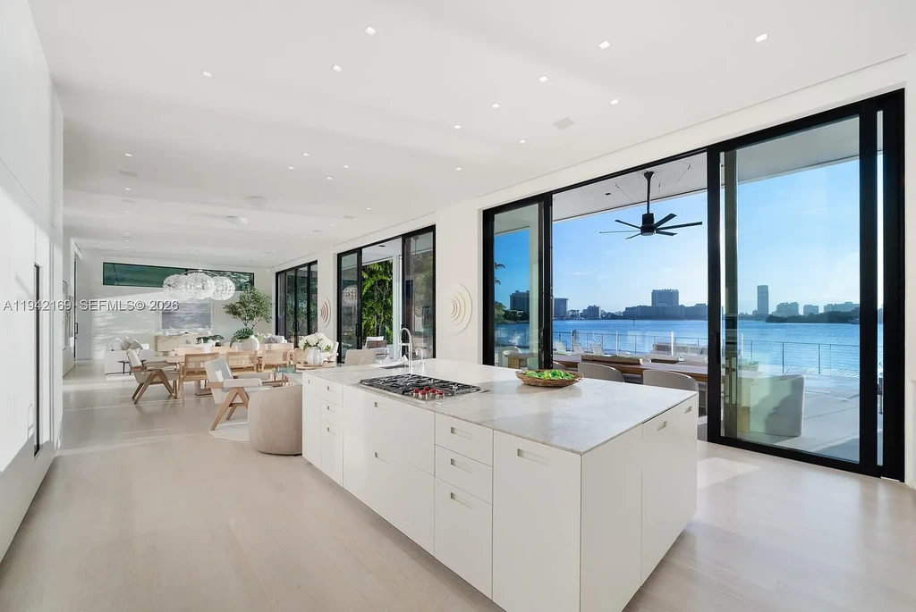 Stunning $35 Million Waterfront Masterpiece Redefining Luxury Living on Miami Beach’s Venetian Islands 10 Waterfront exterior of 33 E Di Lido Dr, a $35 million luxury home on Miami Beach’s Venetian Islands with direct Biscayne Bay frontage