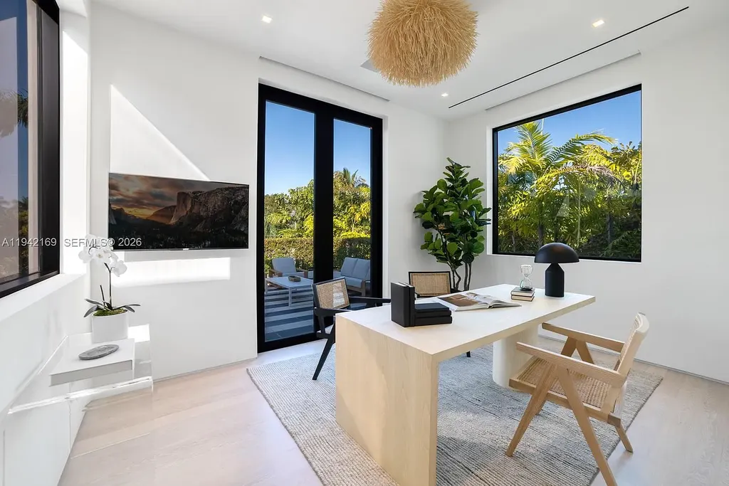 Stunning $35 Million Waterfront Masterpiece Redefining Luxury Living on Miami Beach’s Venetian Islands 14 Waterfront exterior of 33 E Di Lido Dr, a $35 million luxury home on Miami Beach’s Venetian Islands with direct Biscayne Bay frontage