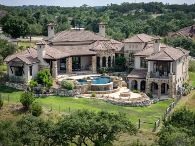 An Elevated Hill Country Lifestyle Awaits at This $3.1M Estate Overlooking the Nicklaus Course 1 35 Winged Foot A Remarkable Hill Country Residence Defined by Golf Course Serenity 1