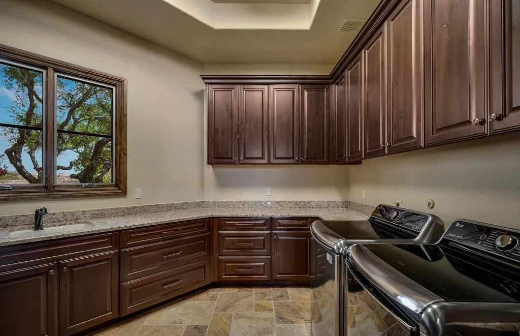 An Elevated Hill Country Lifestyle Awaits at This $3.1M Estate Overlooking the Nicklaus Course 11 35 Winged Foot A Remarkable Hill Country Residence Defined by Golf Course Serenity 15