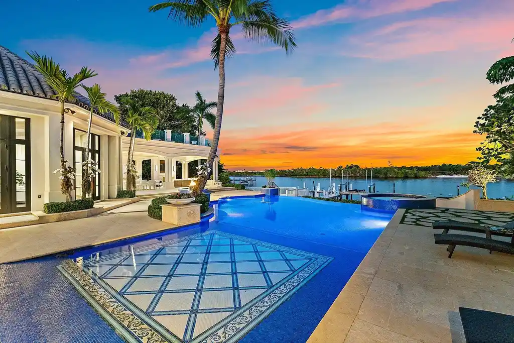 $32 Million Waterfront Icon Redefining Luxury Living in Jupiter Real Estate 16 Waterfront exterior of 372 Regatta Drive in Jupiter, showcasing Intracoastal frontage and luxury estate setting