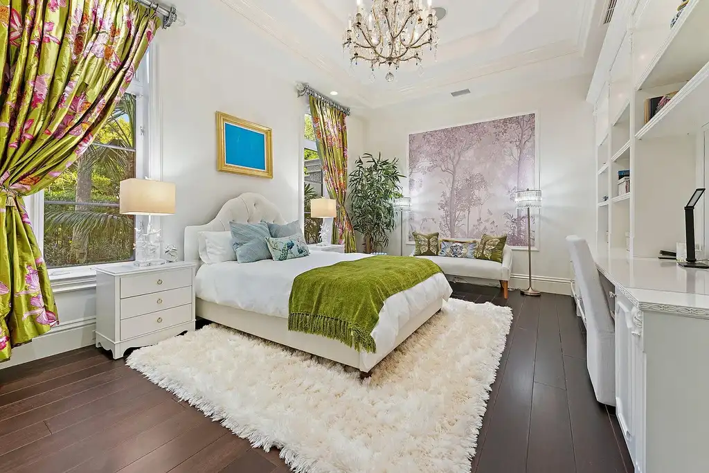 $32 Million Waterfront Icon Redefining Luxury Living in Jupiter Real Estate 14 Waterfront exterior of 372 Regatta Drive in Jupiter, showcasing Intracoastal frontage and luxury estate setting