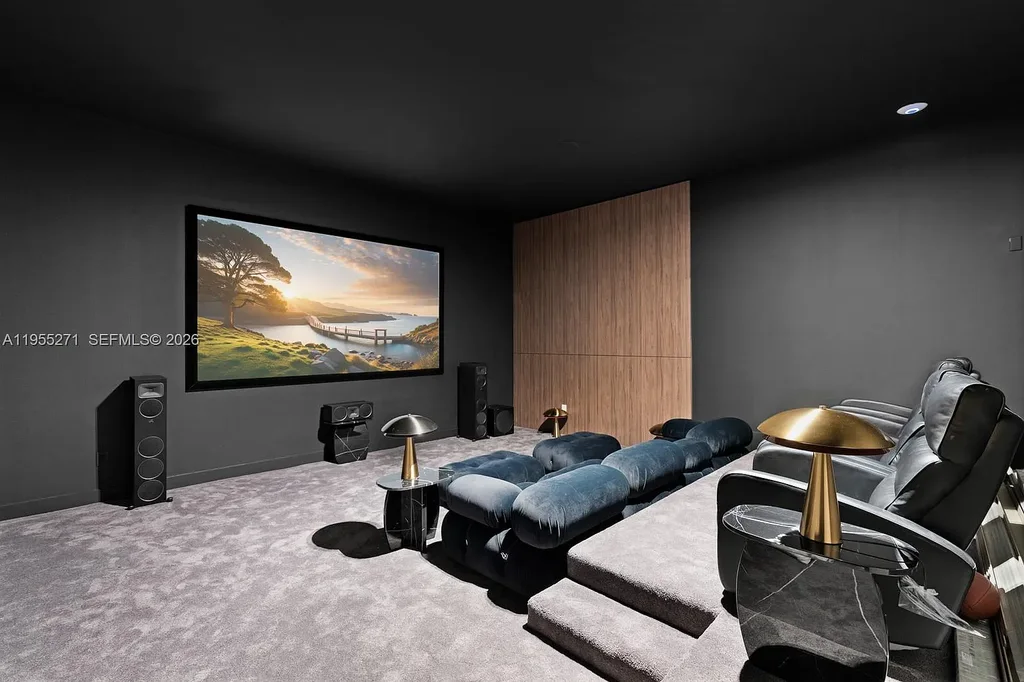 $16.7 Million Newly Built Estate Sets a New Benchmark for Luxury Living in Pinecrest 16 Front exterior of a newly built luxury home at 5900 SW 129th Ter in Pinecrest, Florida, showcasing modern architecture and landscaped grounds