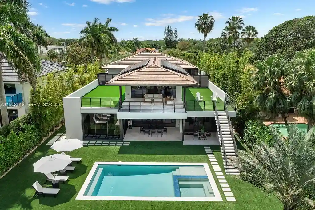 Stunning $7.7 Million Canal-Front Estate Sets a New Benchmark for South Miami Luxury Living 17 6031 SW 88th St canal-front contemporary home in South Miami with resort-style pool